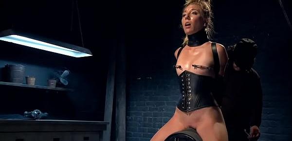  Blonde in leather corset tormented